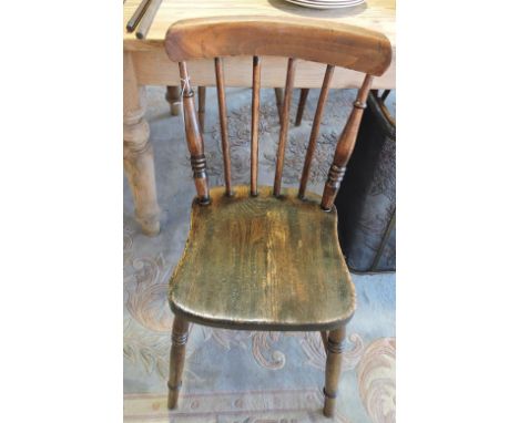 Five Victorian elm and beech Windsor comb back kitchen chairs.