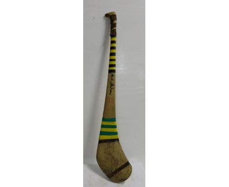 Kilkenny Goalie’s Hurling Stick signed by Noel Skehan (Bennettsbridge) & a hurling sock worn by Skehan “holder of 9 All Irela
