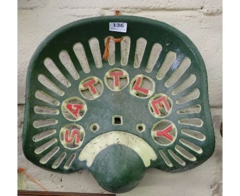 Cast Iron Tractor Seat inscribed “Sattley”, painted green and white (1)