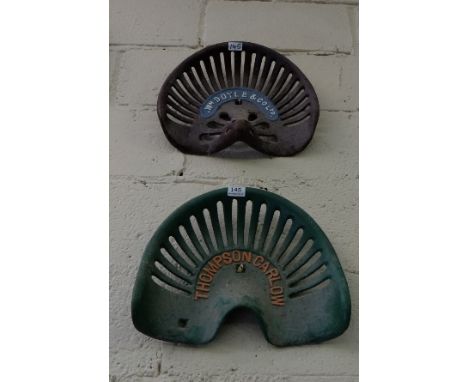 2 Cast Iron Tractor Seats – 1 stamped Thompson, Carlow, painted green & 1 stamped “Wm Doyle & Co., Ltd”, painted brown (2)