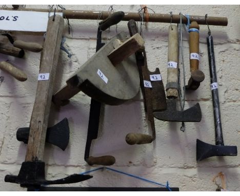 9 Coopers Tools including 5 pick axes, 1 wooden plane, 1 hammer & 1 double handled curved plane (9)