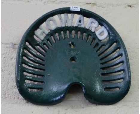 1 Cast Iron Tractor Seat inscribed “Howard”, painted green, model no. CP2 (1)