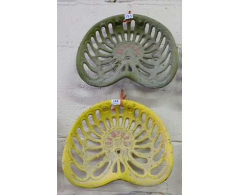 Pair of Cast Iron Tractor Seats stamped “Bamford” one painted yellow, one painted green (2)
