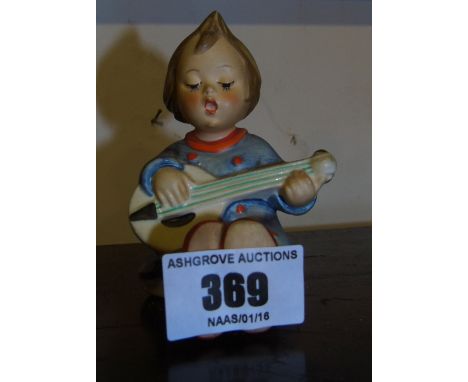 A Goebel Figure of a Boy.