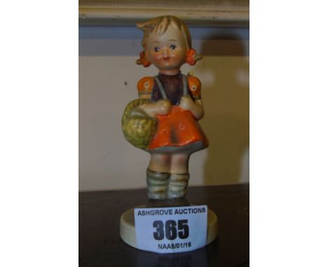 A Goebel Figure of a Girl.