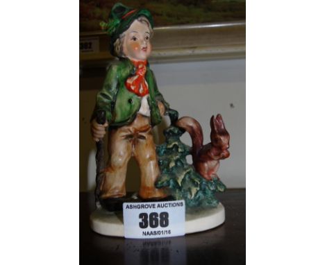A Goebel Figure of a Boy.