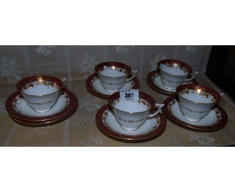 Five Royal Worcester Cups & Saucers with puce marks.