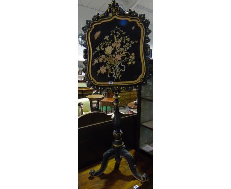 A Late 19th Century Ebonised & Gilt Tripod Polescreen with silk panel.