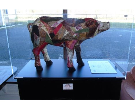 Bernadette Woolhead (Ireland, Contemporary) You Can Turn a Sow's Ear into a Silk Purse. A decorated model of a pig, in a disp