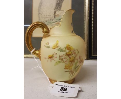 A Royal Worcester Blush Ivory Jug with gilt handle and floral design. Puce marks, Reg. 29115. No. 1094. (Sm.).