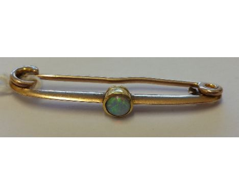A Victorian Gold Opal Bar Brooch.