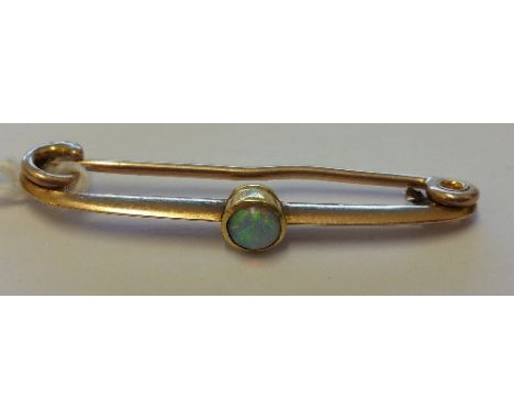 A Victorian Gold Opal Bar Brooch.