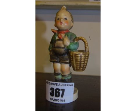 A Goebel Figure of a Boy.