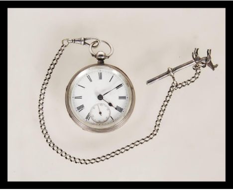 A 19th century Victorian silver hallmarked pocket watch having a fusee movement. The white enamel face having a Roman numeral