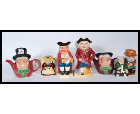 A collection of seven 20th Century ceramic Toby jugs to include examples by Toby Wood, Sylvac, Staffordshire etc. Tallest mea