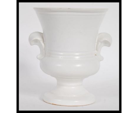 A vintage 20th century cream glazed pottery plant vase / table centerpiece, influenced by florist and designer Constance Spry