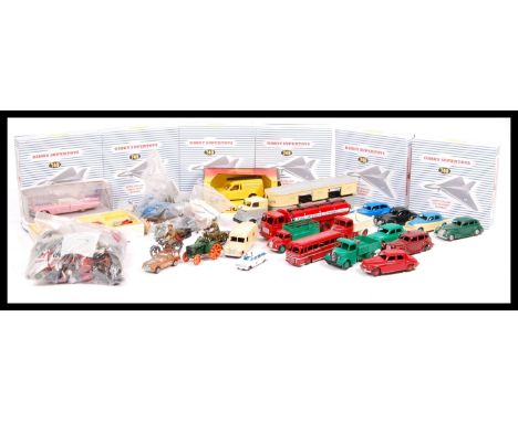 A collection of assorted reproduction, repainted and original diecast models to include a Dinky Supertoys Leyland Octopus Ess