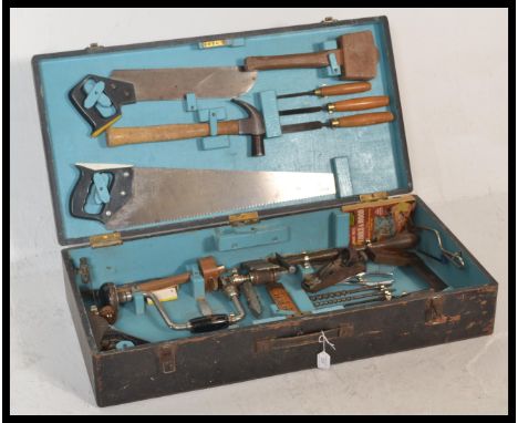 A vintage mid 20th Century 1950's ebonised wood working work box, the hinged lid opening to reveal a fully appointed interior