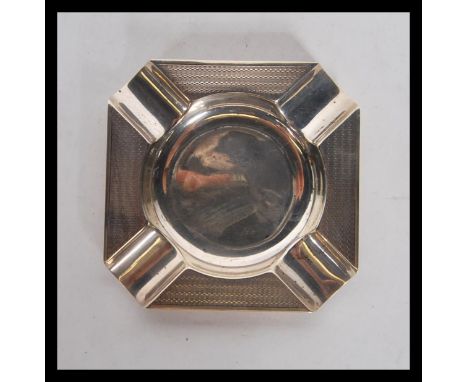 An early 20th Century silver hallmarked ashtray having engine turned decoration to the rims. Hallmarked Birmingham 1928. Weig
