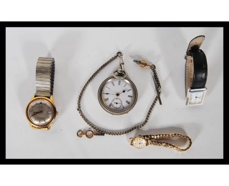 A selection of vintage watches to include a Timex Automatic water resistant watch having a silvered dial with gilt baton mark