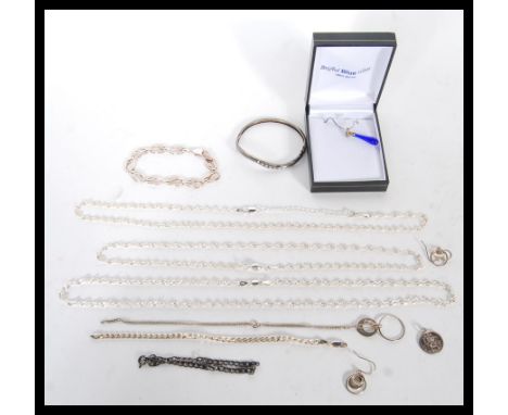 A selection of stamped 925 silver jewellery to include three rope twist necklaces, a demi parure necklace and earrings set, a
