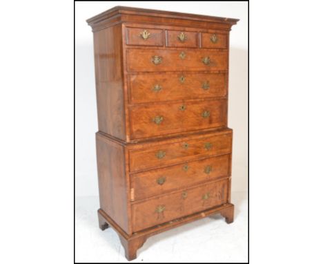 An 18th Century Queen Anne revival walnut inlaid and cross banded chest on chest of drawers / tallboy. The three over six ban