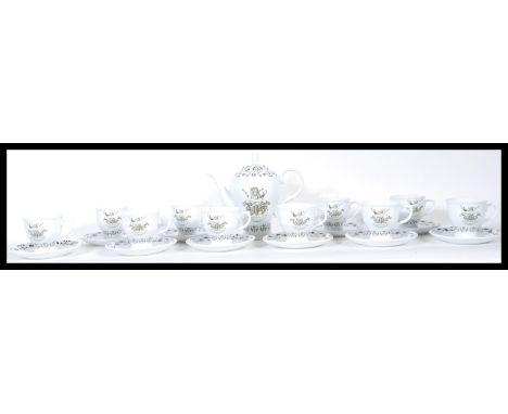 A boxed unused point of sale promotional Hendricks Gin tea service for six, to include teapot, six cups and saucers all with 