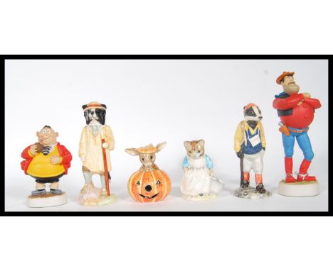 A collection pf ceramic and composite collectable figurines to include a Robert Harrop Desperate Dan BD03 boxed and a Fatty B