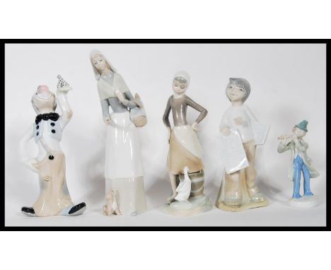 Two ceramic Lladro figurines of young girls holding flowers together with three Spanish made Lladro style ceramic figurines, 