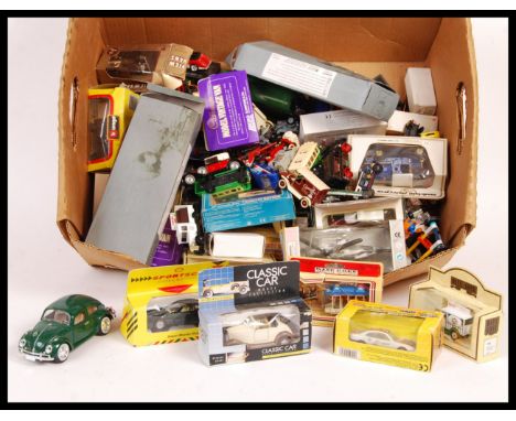 A collection of assorted scale diecast model vehicles to include; Matchbox, Atlas, Hot Wheels, boxed Lledo Days Gone, Bburago