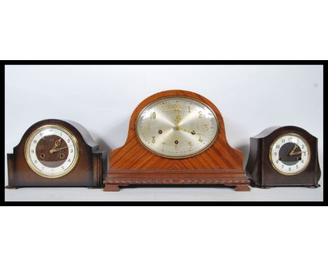 A group of three vintage 20th Century mantel clocks to include a Smiths bakelite cased clock having a round face and Arabic n
