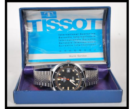 A gentleman's vintage Tissot Swiss Navigator automatic stainless steel wrist watch having a round dial with square hour marke