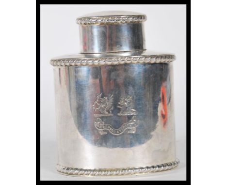 A 19th Century Victorian silver hallmarked tea caddy having gadrooned bordered having engraved dragon decoration to the front