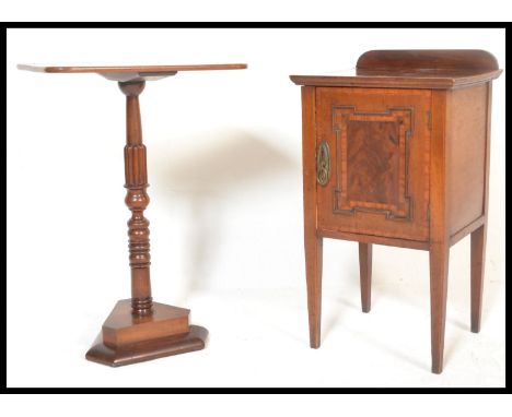 An Edwardian mahogany inlaid pot cupboard and a Victorian mahogany tripod wine table with rectangular table top and trefoil b