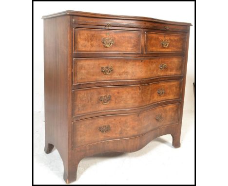 A good early 20th century Georgian revival bachelors walnut serpentine fronted chest of drawers. Raised on bracket feet havin
