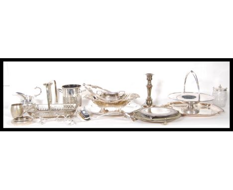 A large collection of silver plated items to include&nbsp;candlesticks, tray, serving dishes, tea caddy, etc.