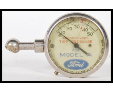A early 20th Century pre war tyre pressure gauge for a Ford Model A car, made by the U. S Gauge Company New York for The Ford