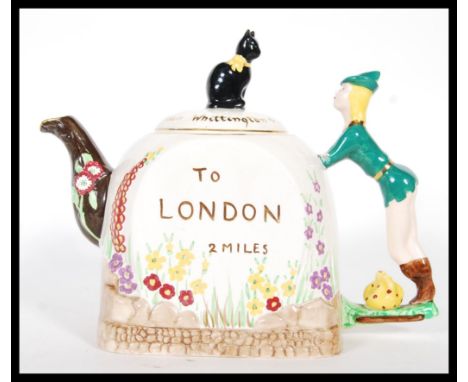 A  20th Century 1930's/40's novelty teapot by Bancroft & Bennett Staffordshire. The handle in the form of Dick Whittington Lo