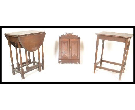 A 19th Century Victorian oak hanging box fitted with a single panel door together with an oak drop flap dining table and an o