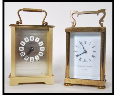 A 20th Century Matthew Norman brass cased carriage clock, with Swiss movement, black Roman numerals to white dial together wi