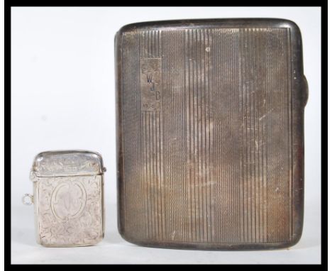 A early 20th Century silver hallmarked cigarette case and vesta case. The cigarette case made by&nbsp;S M Levi Ltd being of c