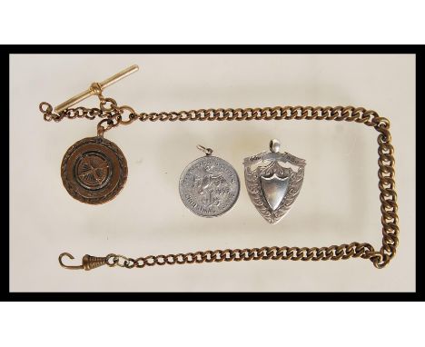 An early 20th Century watch fob chain together with a silver hallmarked fob medal with Birmingham assay marks dating to 1934 