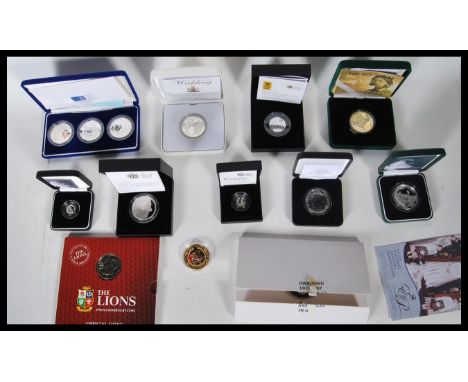 A collection of Royal Mint Uncirculated mostly silver proof coinage to include, Lady with the Lamp £5 pound coin in presentat