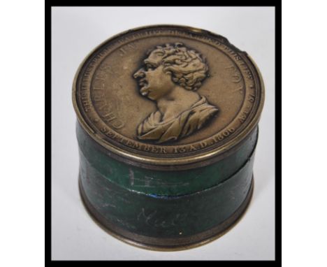 Politics - a 19th Century circular ebony and medallic snuff box, commemorating the life of Charles James Fox, The Illustrious