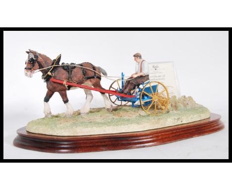 A Border Fine Arts limited edition 626/950 figure, model 'Rowing Up' by Ray Ayres. Raised on a wooden base and signed by the 