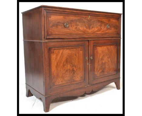 A Georgian mahogany secretaire chest of drawers. The fall front with fully appointed interior over three long graduating draw