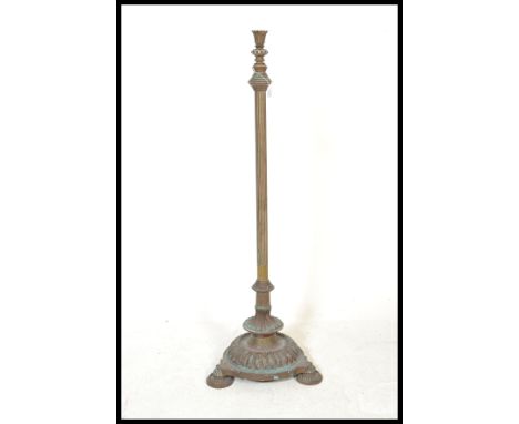 An early 20th Century brass and copper standard lamp, having flared top on&nbsp;corinthian style column being ajustable, rais