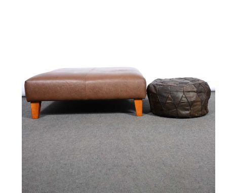 Two contemporary leather footstools, one square form, light brown raised on stained wood supports, width 92cm, height 36cm; t