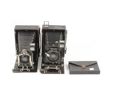 Two Ernemann-Werke folding plate cameras, models Heag II and Heag XI; along with a pack of three plates, cased.