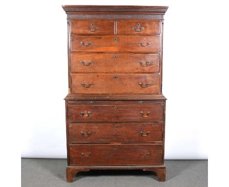 George III mahogany chest on chest, cavetto and dentil mounded cornice, two short and six long graduating drawers and a brush